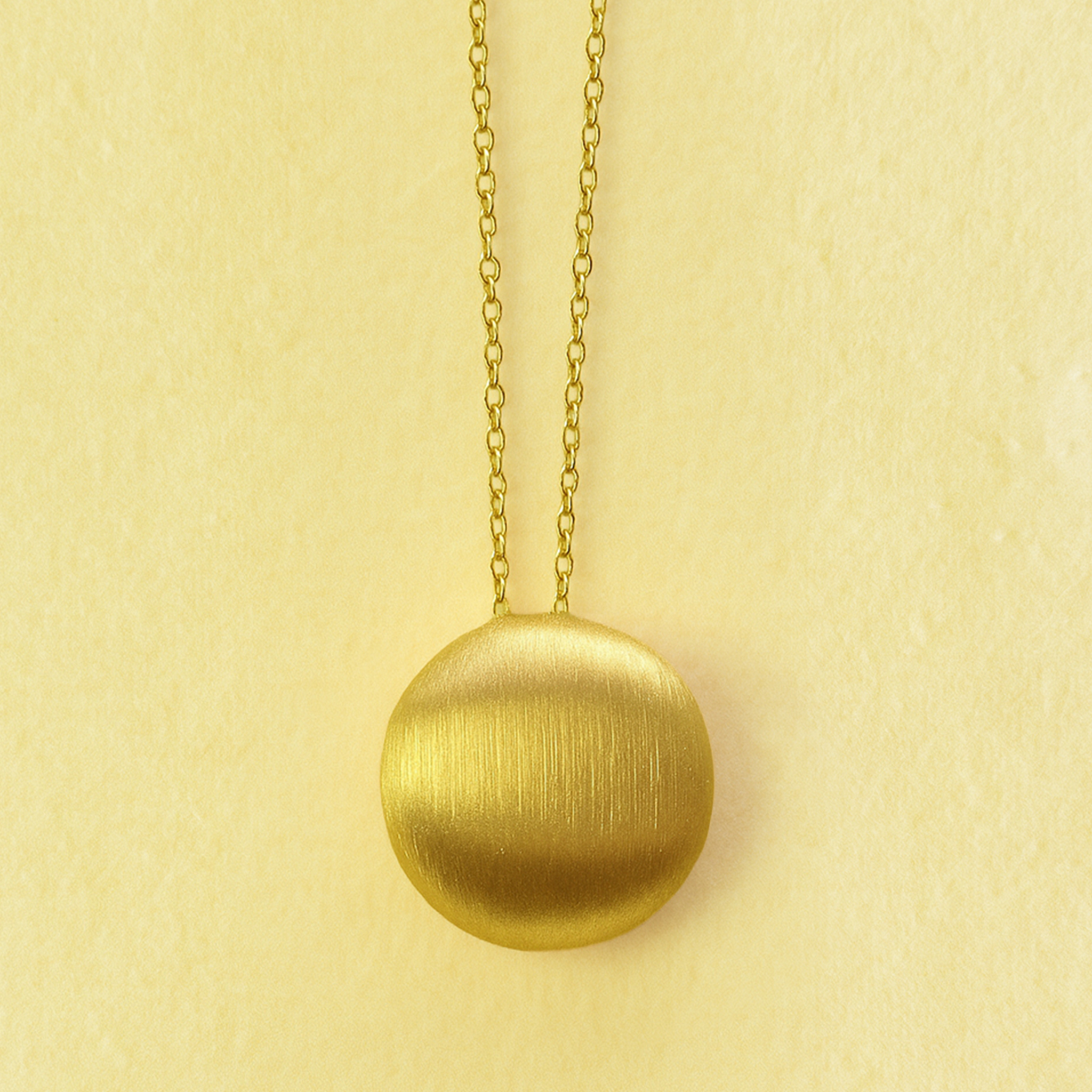 Sole Disc Pendant